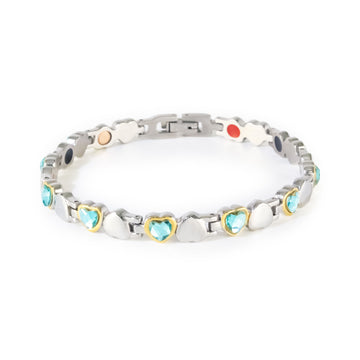 Cherish stainless steel and gold bracelet with blue Swarovski crystals clasped front view, heart-link design.